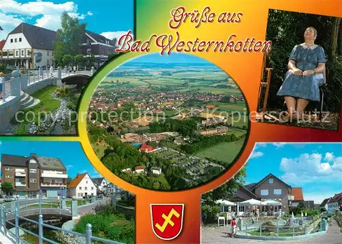 AK / Ansichtskarte Bad_Westernkotten Solebad Kurhaus Ortskern Statue Fliegeraufnahme Bad_Westernkotten