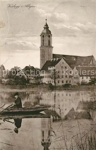 AK / Ansichtskarte Kisslegg Uferpartie am See Ruderboot Blick zur Kirche Kisslegg