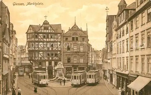 AK / Ansichtskarte Giessen_Lahn Marktplatz Denkmal Strassenbahn Giessen_Lahn