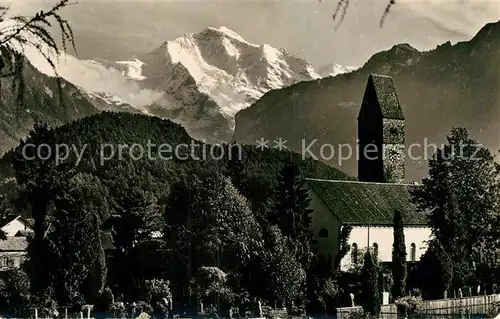 AK / Ansichtskarte Unterseen mit Kirche und Jungfrau Unterseen