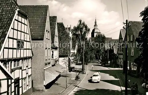 AK / Ansichtskarte Wiedenbrueck Langestra?e Kirche Fachwerk / Wiedenbrueck