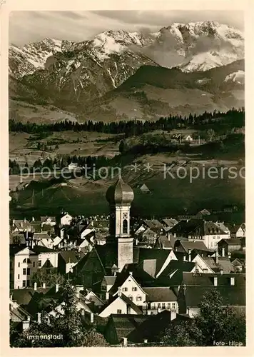 AK / Ansichtskarte Immenstadt_Allgaeu Ortsansicht mit Kirche mit Blick zum Daumen Allgaeuer Alpen Immenstadt_Allgaeu