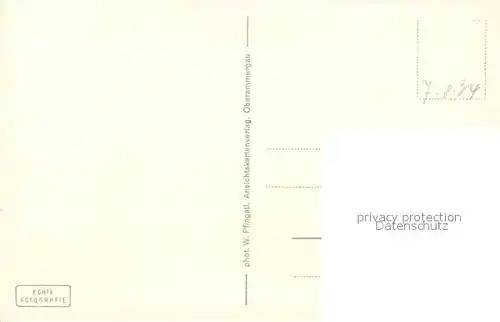 AK / Ansichtskarte Oberammergau Partie am Dorfplatz Oberammergau