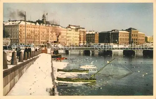 AK / Ansichtskarte Stockholm Stroembron Winteraufnahme Stockholm