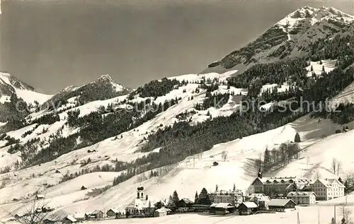 AK / Ansichtskarte Melchtal Kirche Winterpanorama Melchtal