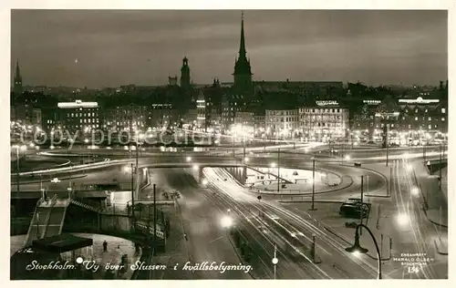 AK / Ansichtskarte Stockholm Vy oever Slussen i kvaellsbelsning Stockholm