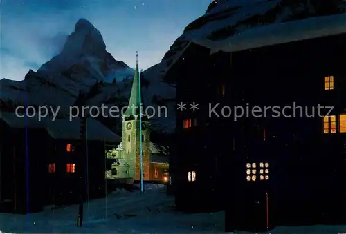 AK / Ansichtskarte Zermatt_VS Abendstimmung mit Kirche und Matterhorn Zermatt_VS