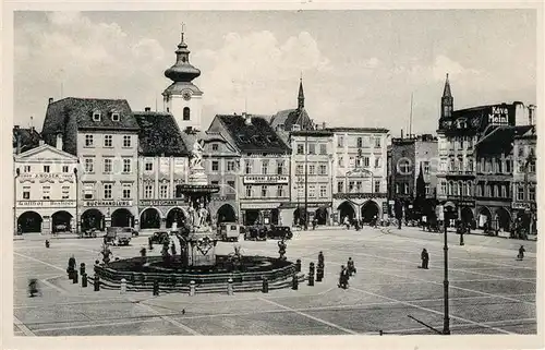 AK / Ansichtskarte Budweis_Suedboehmen Marktplatz Brunnen Kirche Budweis Suedboehmen