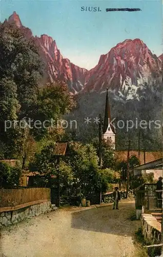 AK / Ansichtskarte Siusi_allo_Sciliar Ortsmotiv mit Kirche Dolomiten Siusi_allo_Sciliar