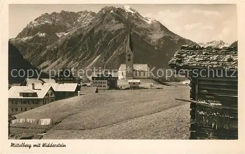 AK / Ansichtskarte Mittelberg_Vorarlberg Ortsmotiv mit Kirche Blick zum Widderstein Mittelberg Vorarlberg