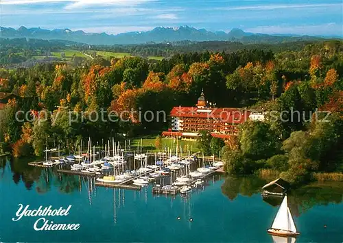 AK / Ansichtskarte Prien_Chiemsee Fliegeraufnahme Yachthotel Chiemsee Prien Chiemsee