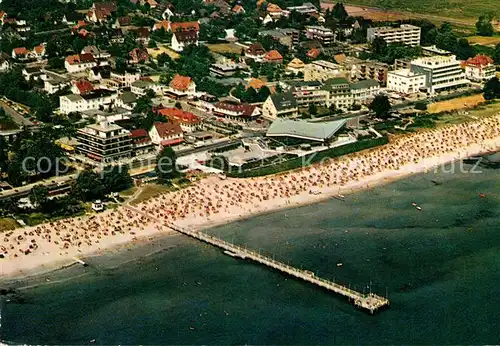 AK / Ansichtskarte Scharbeutz_Ostseebad Fliegeraufnahme Seebruecke Meerwasserwellenbad Scharbeutz_Ostseebad