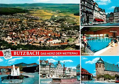 AK / Ansichtskarte Butzbach Fliegeraufnahme Buergerhaus Marktplatz Landgraefliches Schloss Hallenbad Butzbach