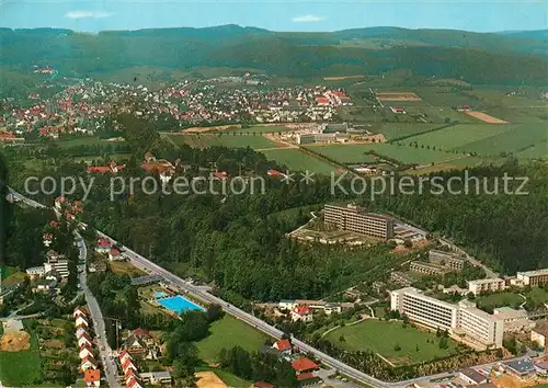 AK / Ansichtskarte Bad_Driburg Sanatorium Kliniken Kurpark City Fliegeraufnahme Bad_Driburg