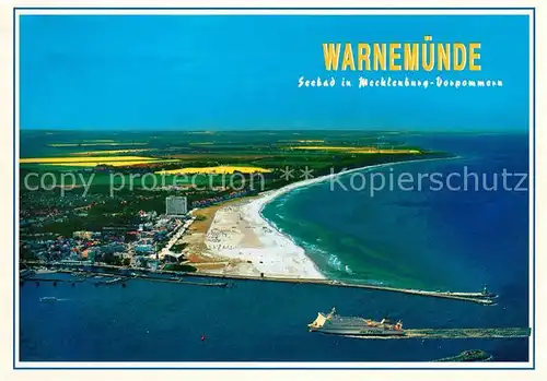 AK / Ansichtskarte Warnemuende_Ostseebad Strand Mole Hafeneinfahrt Faehre Fliegeraufnahme Warnemuende_Ostseebad