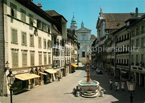 AK / Ansichtskarte Solothurn Hauptgasse mit St Ursen Kathedrale Brunnen Solothurn