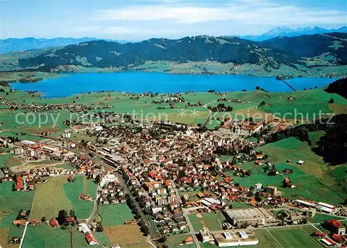 AK / Ansichtskarte Einsiedeln_SZ Fliegeraufnahme Wallfahrtsort mit Sihlsee und Saentis Einsiedeln SZ