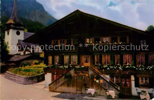 AK / Ansichtskarte Gsteig Hotel Baeren mit Kirche Gsteig