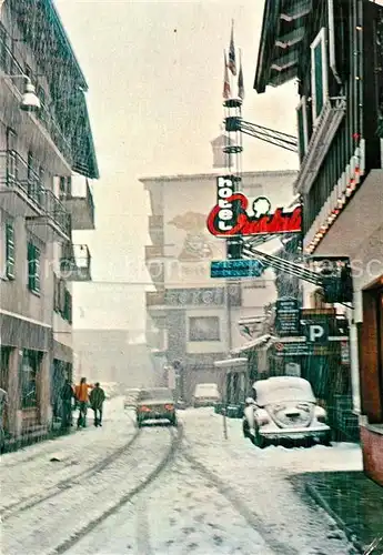 AK / Ansichtskarte Courmayeur Via Roma verschneit Courmayeur