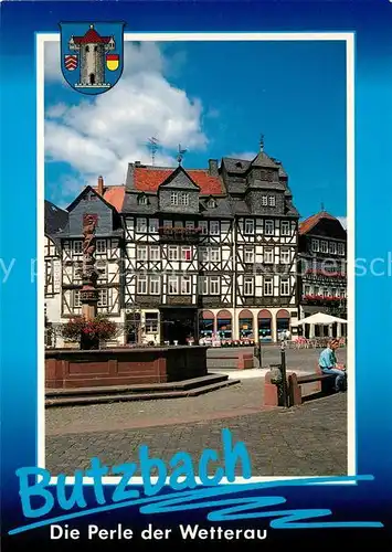 AK / Ansichtskarte Butzbach Brunnen Marktplatz Fachwerkhaeuser Altstadt Butzbach