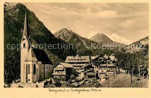 AK / Ansichtskarte Heiligenblut_Kaernten mit Kirche und Grossglockner Heiligenblut Kaernten