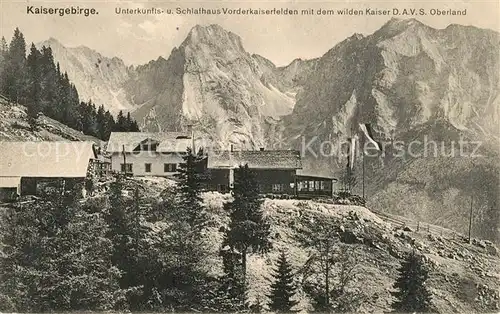 AK / Ansichtskarte Kaisergebirge Unterkunftshaus Vorderkaiserfelden mit dem Wilden Kaiser Kaisergebirge