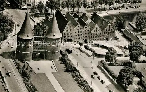 AK / Ansichtskarte Luebeck Holstentor und Salzspeicher Fliegeraufnahme Luebeck