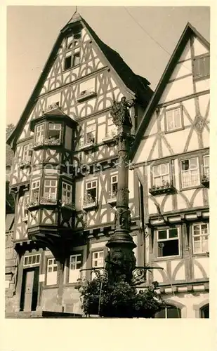 AK / Ansichtskarte Miltenberg_Main Brunnen Figur Altstadt Fachwerkhaeuser Erker Miltenberg Main