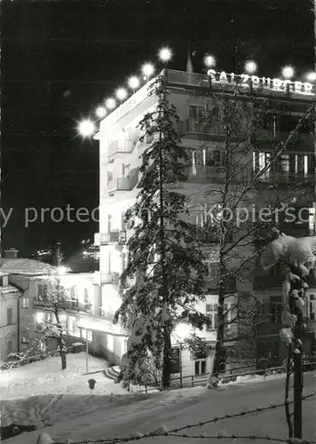 AK / Ansichtskarte Bad_Gastein Hotel Salzburgerhof im Winter Nachtaufnahme Bad_Gastein