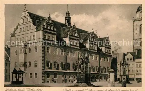 AK / Ansichtskarte Wittenberg_Lutherstadt Rathaus Lutherdenkmal Melanthondenkmal Wittenberg_Lutherstadt