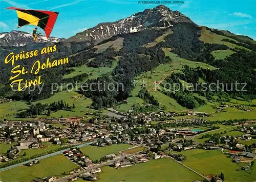 AK / Ansichtskarte St_Johann_Tirol mit Kitzbueheler Horn Drachenflieger Fliegeraufnahme St_Johann_Tirol