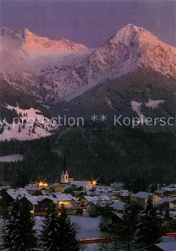 AK / Ansichtskarte Fischen_Allgaeu Wintersportplatz mit Nebelhorn und Rubihorn in der Abendsonne Allgaeuer Alpen Fischen Allgaeu