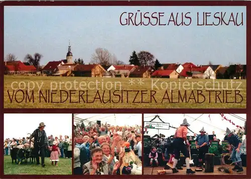 AK / Ansichtskarte Lieskau_Lichterfeld Schacksdorf Ortsansicht mit Kirche Niederlausitzer Almabtrieb Lieskau