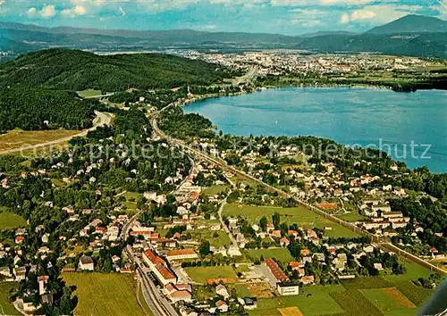 AK / Ansichtskarte Krumpendorf_Woerthersee Fliegeraufnahme mit Klagenfurt  Krumpendorf Woerthersee