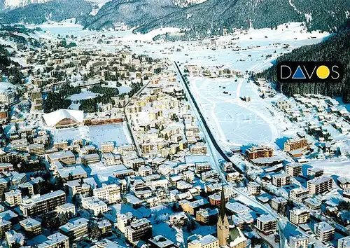AK / Ansichtskarte Davos_GR Fliegeraufnahme mit Eissporthalle Natureisbahn Langlaufzentrum Davos_GR
