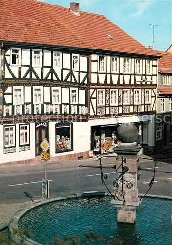 AK / Ansichtskarte Tann_Rhoen Marktbrunnen mit Elf Apostelhaus Ulstertal Tann_Rhoen