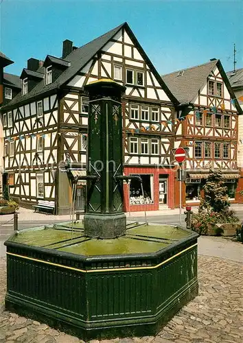 AK / Ansichtskarte Dillenburg Brunnen Obere Hauptstrasse Fachwerk Oranierstadt Dillenburg