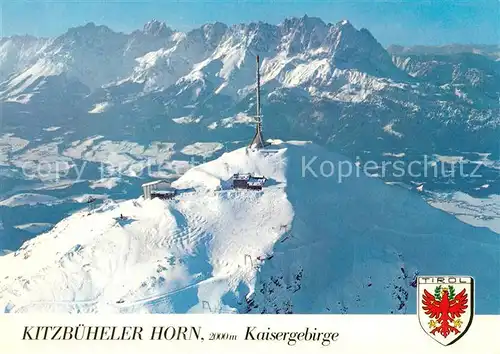 AK / Ansichtskarte Kitzbuehel_Tirol Kitzbueheler Horn Kaisergebirge Blick auf Grossglockner Grossvenedigermassiv Alpenpanorama im Winter Fliegeraufnahme Kitzbuehel Tirol