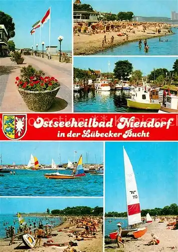 AK / Ansichtskarte Niendorf_Ostseebad Strand Promenade Segelboote Niendorf_Ostseebad