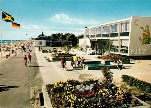 AK / Ansichtskarte Kellenhusen_Ostseebad Partie am Kurmittelhaus Promenade Strand Kellenhusen_Ostseebad