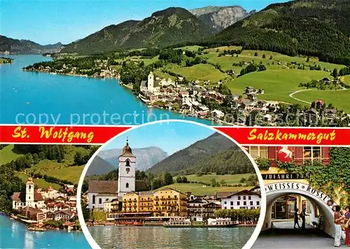 AK / Ansichtskarte St_Wolfgang_Salzkammergut Panorama Wolfgangsee Alpen Fliegeraufnahme 1000 Jahre Wallfahrtsort Hotel Weisses Roessl Kirche St_Wolfgang_Salzkammergut