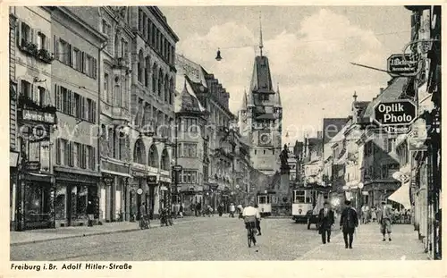 AK / Ansichtskarte Freiburg_Breisgau AH Strasse Strassenbahnen Freiburg Breisgau