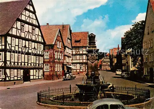 AK / Ansichtskarte Hofgeismar Marktplatz Brunnen Altstadt Fachwerkhaeuser Hofgeismar