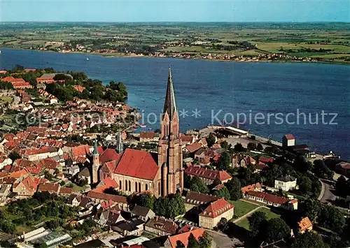 AK / Ansichtskarte Schleswig_Holstein Stadtbild mit St Petri Dom Schlei Fliegeraufnahme Schleswig_Holstein