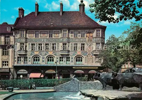 AK / Ansichtskarte Muenchen Ruffini Haus Historisches Gebaeude mit Rinderbrunnen Muenchen