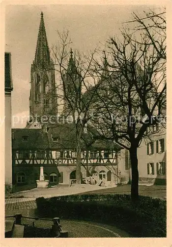 AK / Ansichtskarte Freiburg_Breisgau Muenster mit Muensterbauhuette Freiburg Breisgau