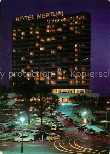 AK / Ansichtskarte Warnemuende_Ostseebad Hotel Neptun Nachtaufnahme Warnemuende_Ostseebad