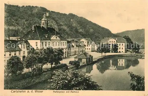 AK / Ansichtskarte Carlshafen_Weser Hafenplatz mit Rathaus Carlshafen Weser