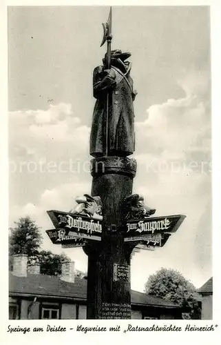 AK / Ansichtskarte Springe_Deister Wegweiser mit Ratsnachtwaechter Heinerich Springe_Deister