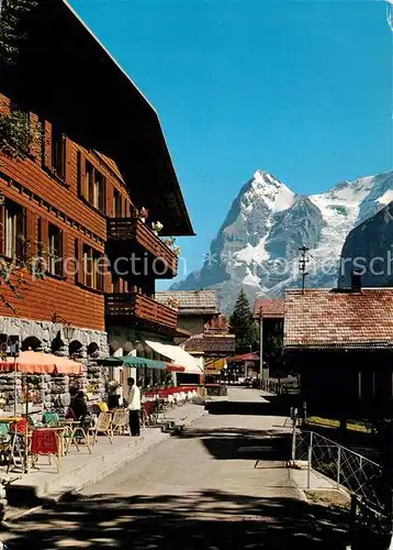 AK / Ansichtskarte Muerren_BE Dorfstrasse mit Hotel Blumental und Eiger Muerren_BE